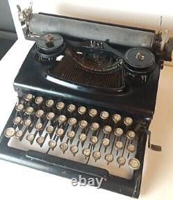 Antique Vintage Typewriter. Black Retro Portable Collectible Russian keyboard