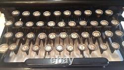 Antique Vintage Typewriter. Black Retro Portable Collectible Russian keyboard